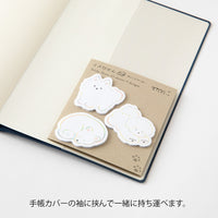 Set of bear-shaped sticky notes on a notebook cover